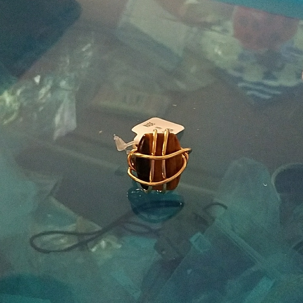 Brown with gold ring